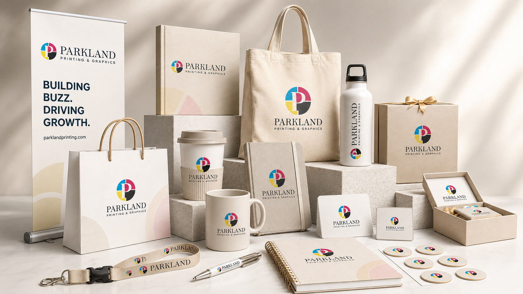 A coordinated assortment of tumblers, mugs, pens, totes and branded giveaway items